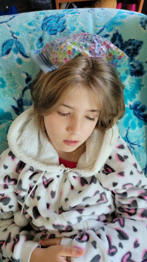 orbeez cold pack on girl's head